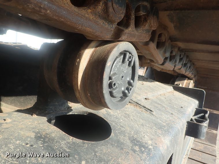 image for item DI7270 1990 Caterpillar 325C L  excavator with material placer