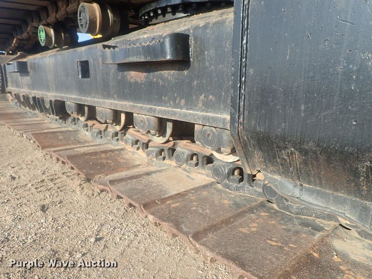 image for item DI7270 1990 Caterpillar 325C L  excavator with material placer