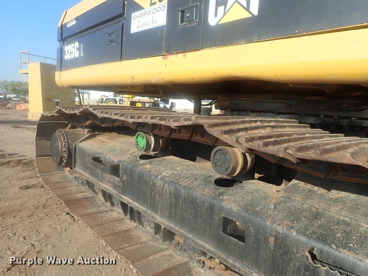 image for item DI7270 1990 Caterpillar 325C L  excavator with material placer