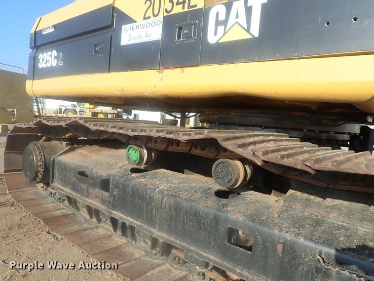 image for item DI7270 1990 Caterpillar 325C L  excavator with material placer