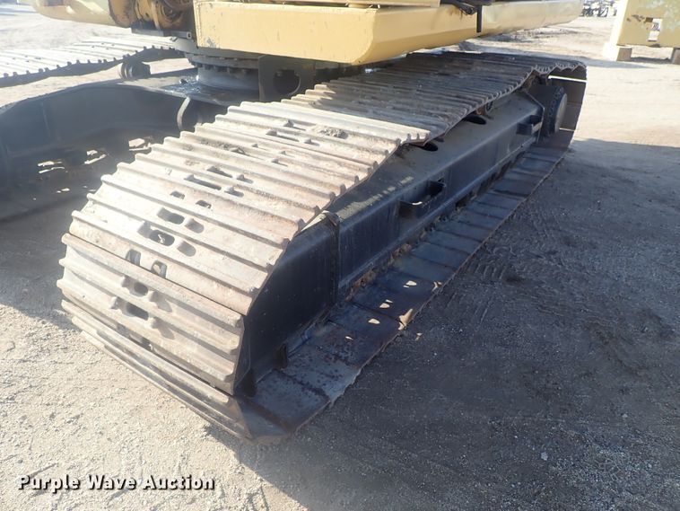 image for item DI7270 1990 Caterpillar 325C L  excavator with material placer