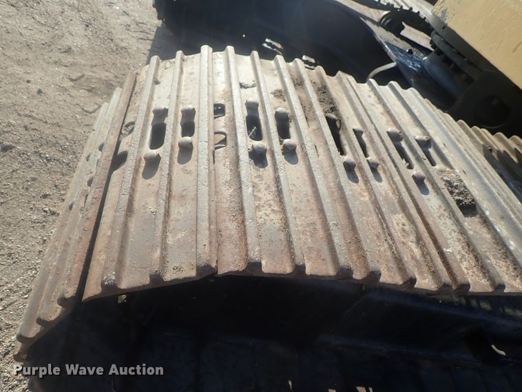 image for item DI7270 1990 Caterpillar 325C L  excavator with material placer