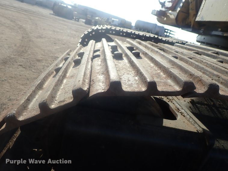 image for item DI7270 1990 Caterpillar 325C L  excavator with material placer