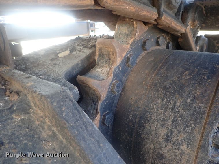 image for item DI7270 1990 Caterpillar 325C L  excavator with material placer