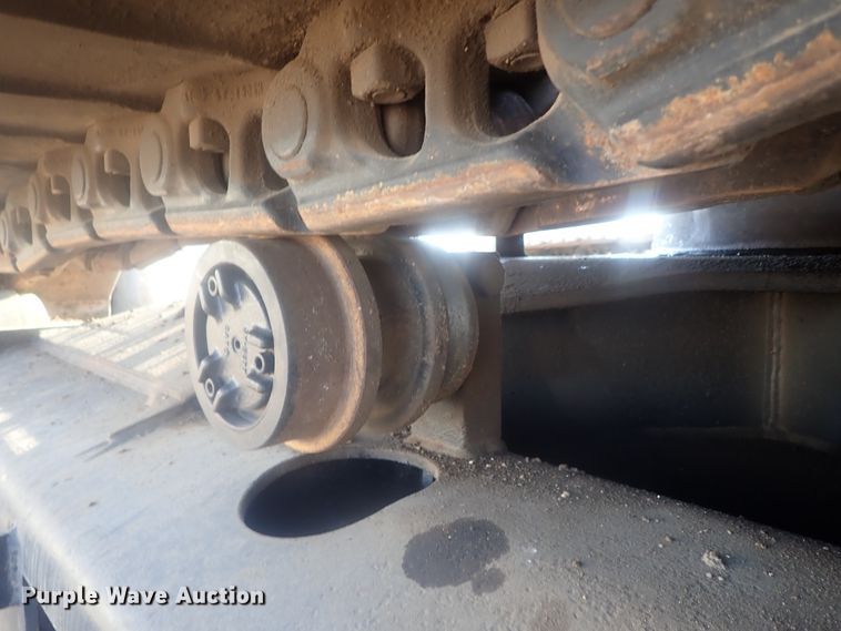 image for item DI7270 1990 Caterpillar 325C L  excavator with material placer