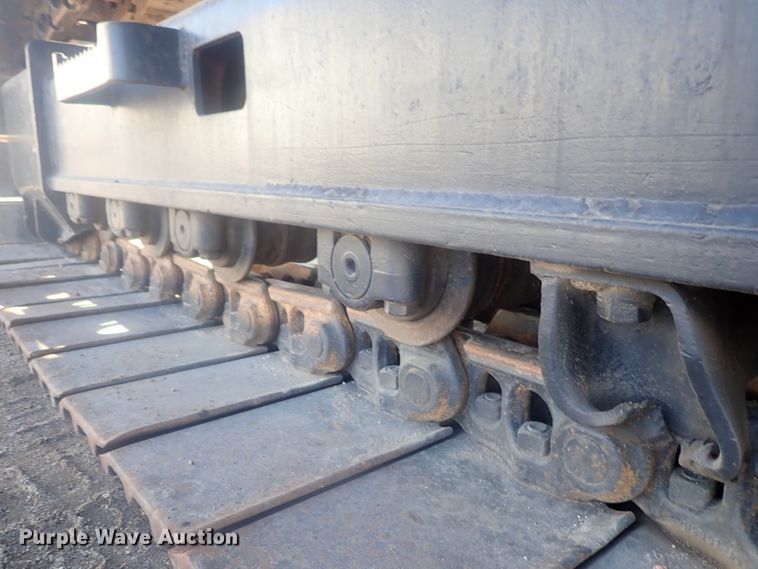 image for item DI7270 1990 Caterpillar 325C L  excavator with material placer