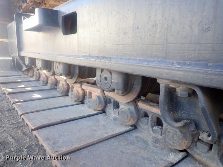 image for item DI7270 1990 Caterpillar 325C L  excavator with material placer