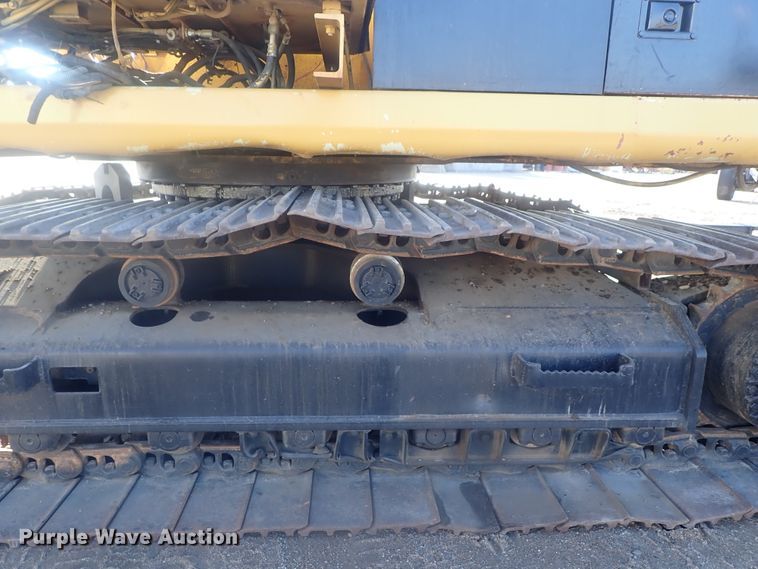 image for item DI7270 1990 Caterpillar 325C L  excavator with material placer