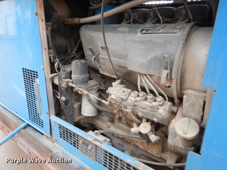 image for item DJ6524 Miller Air Pak welder/generator/air compressor