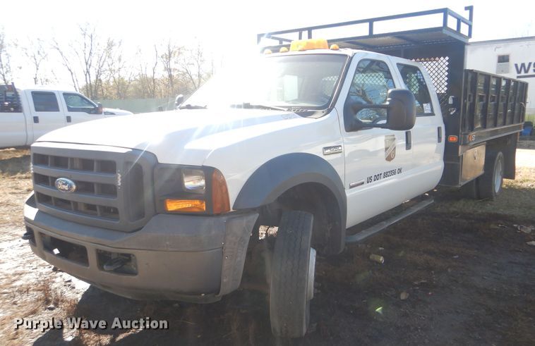 image for item DJ8508 2006 Ford F450 Super Duty  Crew Cab dump flatbed truck