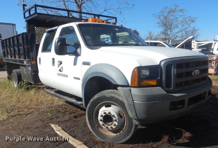 image for item DJ8508 2006 Ford F450 Super Duty  Crew Cab dump flatbed truck