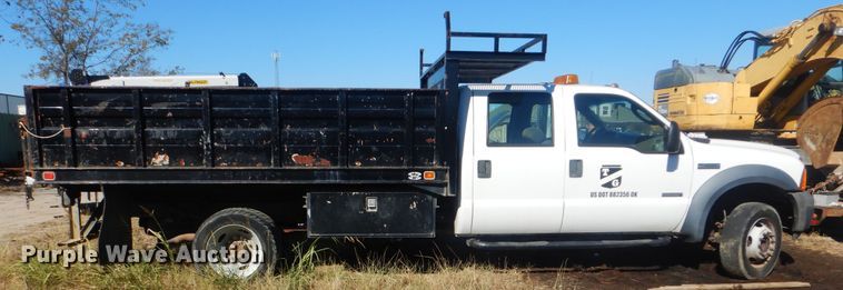 image for item DJ8508 2006 Ford F450 Super Duty  Crew Cab dump flatbed truck