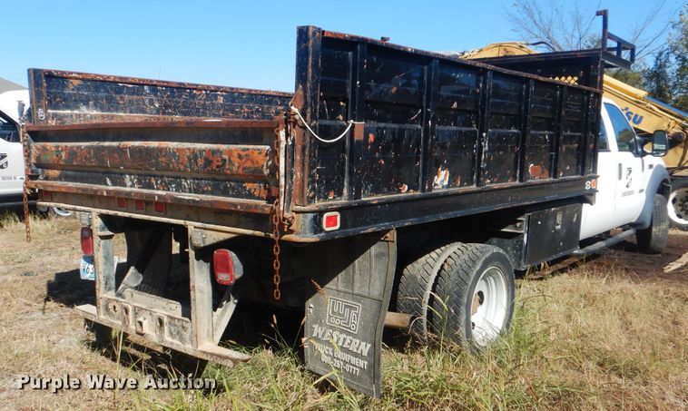 image for item DJ8508 2006 Ford F450 Super Duty  Crew Cab dump flatbed truck