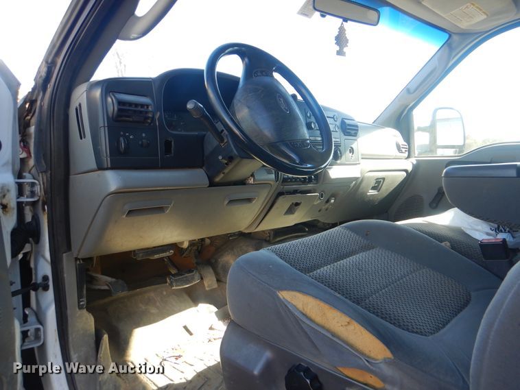 image for item DJ8508 2006 Ford F450 Super Duty  Crew Cab dump flatbed truck