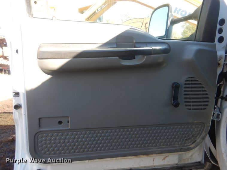 image for item DJ8508 2006 Ford F450 Super Duty  Crew Cab dump flatbed truck