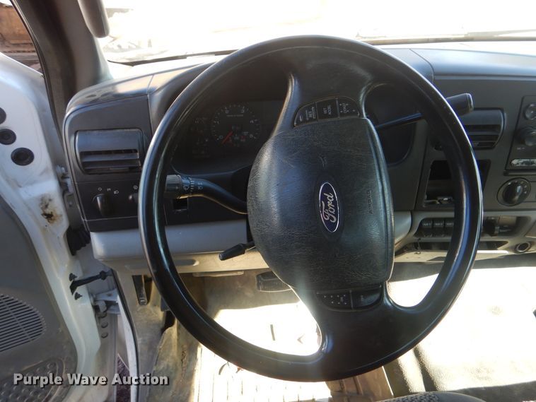 image for item DJ8508 2006 Ford F450 Super Duty  Crew Cab dump flatbed truck