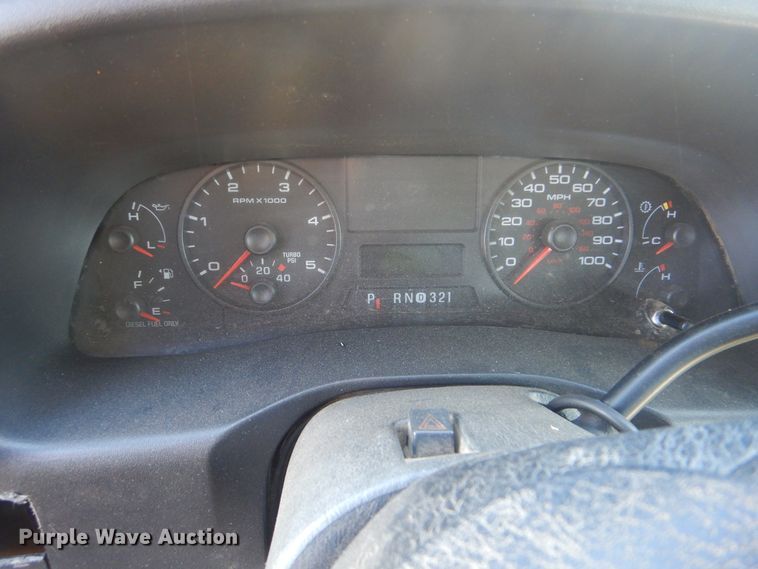 image for item DJ8508 2006 Ford F450 Super Duty  Crew Cab dump flatbed truck