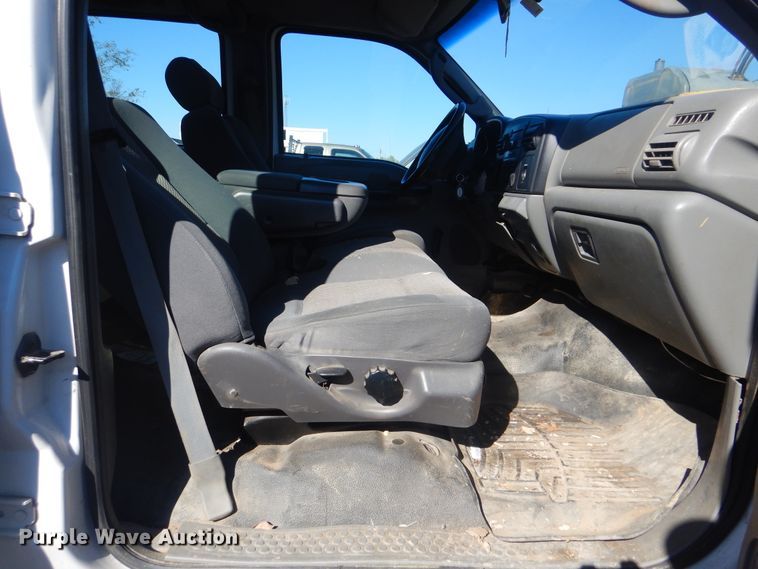 image for item DJ8508 2006 Ford F450 Super Duty  Crew Cab dump flatbed truck