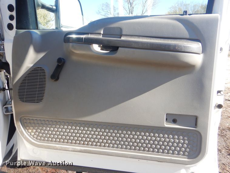 image for item DJ8508 2006 Ford F450 Super Duty  Crew Cab dump flatbed truck