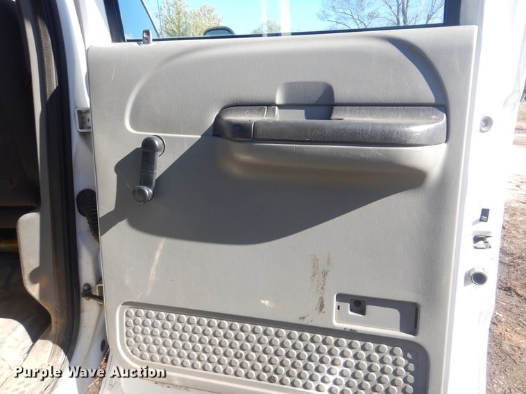 image for item DJ8508 2006 Ford F450 Super Duty  Crew Cab dump flatbed truck