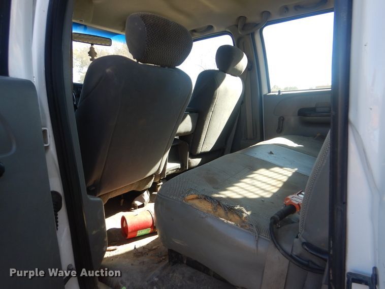 image for item DJ8508 2006 Ford F450 Super Duty  Crew Cab dump flatbed truck