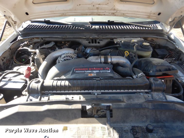 image for item DJ8508 2006 Ford F450 Super Duty  Crew Cab dump flatbed truck