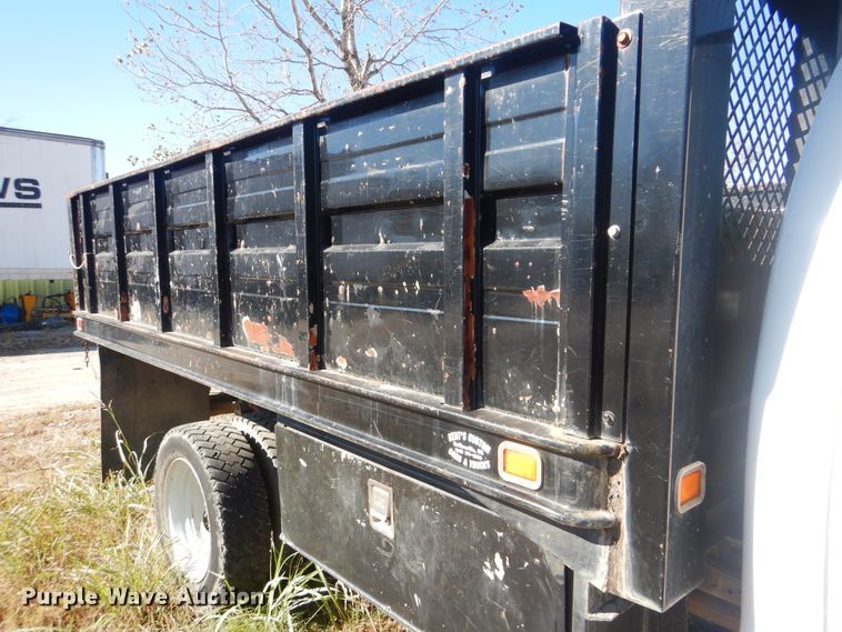 image for item DJ8508 2006 Ford F450 Super Duty  Crew Cab dump flatbed truck