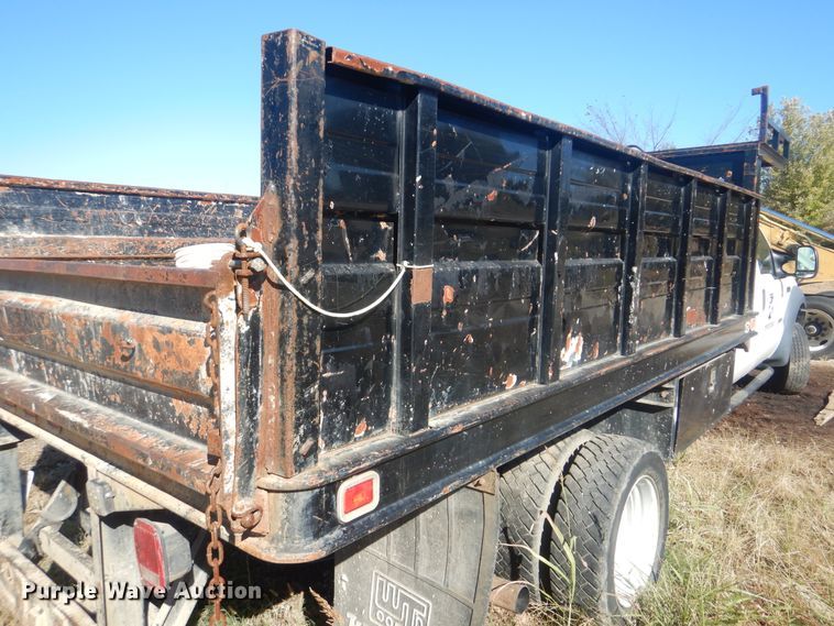 image for item DJ8508 2006 Ford F450 Super Duty  Crew Cab dump flatbed truck
