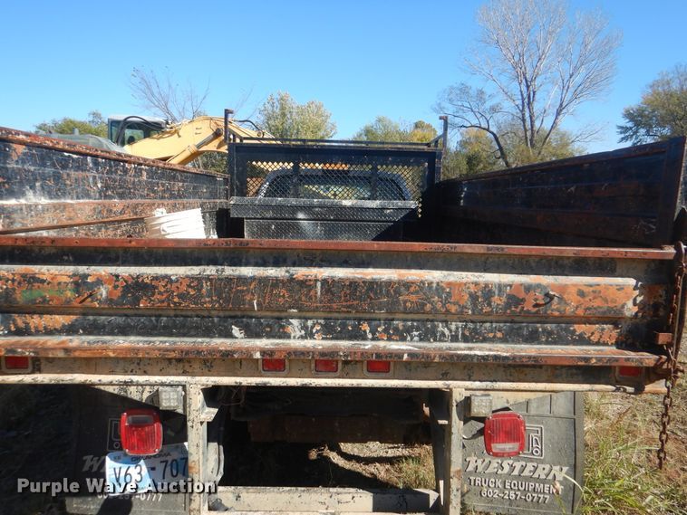 image for item DJ8508 2006 Ford F450 Super Duty  Crew Cab dump flatbed truck