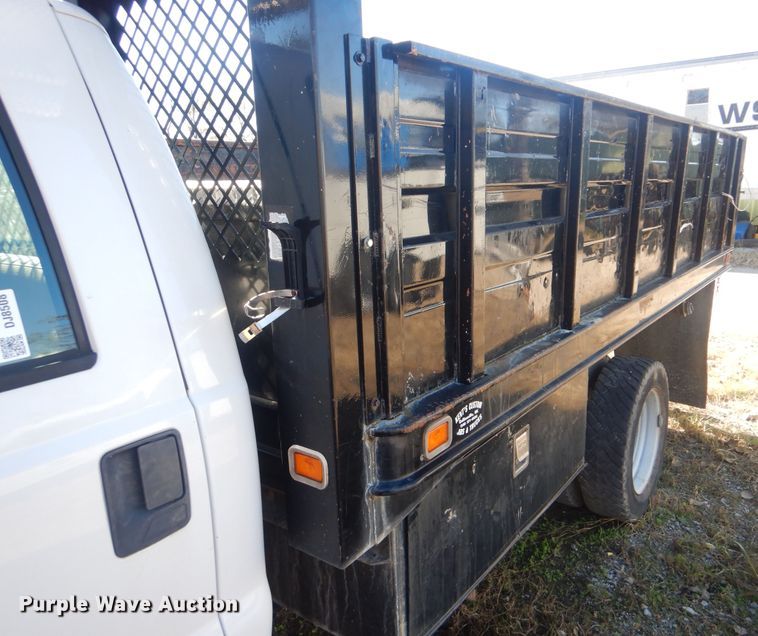 image for item DJ8508 2006 Ford F450 Super Duty  Crew Cab dump flatbed truck