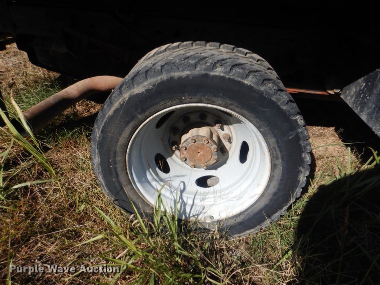 image for item DJ8508 2006 Ford F450 Super Duty  Crew Cab dump flatbed truck