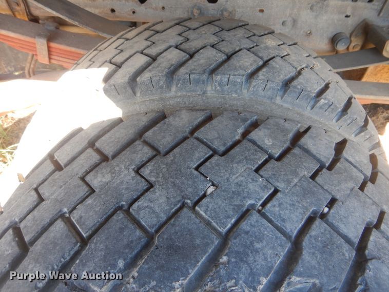 image for item DJ8508 2006 Ford F450 Super Duty  Crew Cab dump flatbed truck