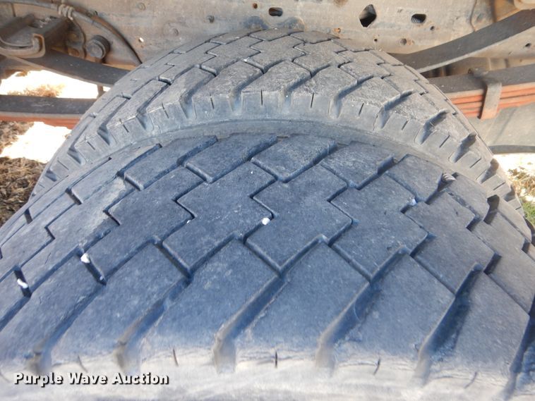 image for item DJ8508 2006 Ford F450 Super Duty  Crew Cab dump flatbed truck