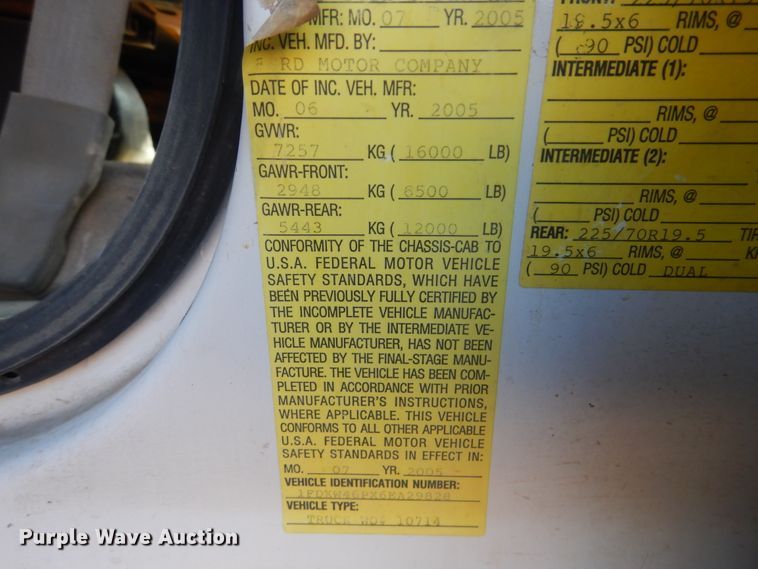 image for item DJ8508 2006 Ford F450 Super Duty  Crew Cab dump flatbed truck