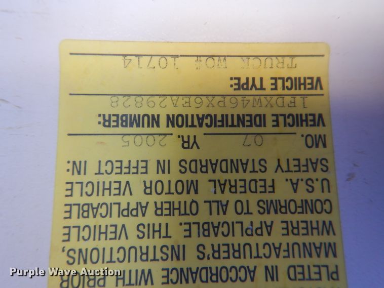 image for item DJ8508 2006 Ford F450 Super Duty  Crew Cab dump flatbed truck