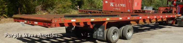 image for item HD9097 2006 Trussmaster roll off tilt deck trailer