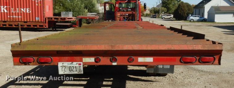 image for item HD9097 2006 Trussmaster roll off tilt deck trailer