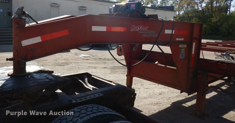 image for item HD9097 2006 Trussmaster roll off tilt deck trailer