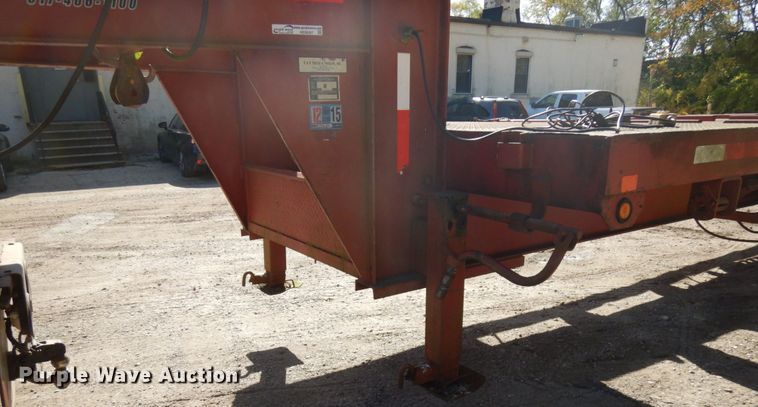 image for item HD9097 2006 Trussmaster roll off tilt deck trailer