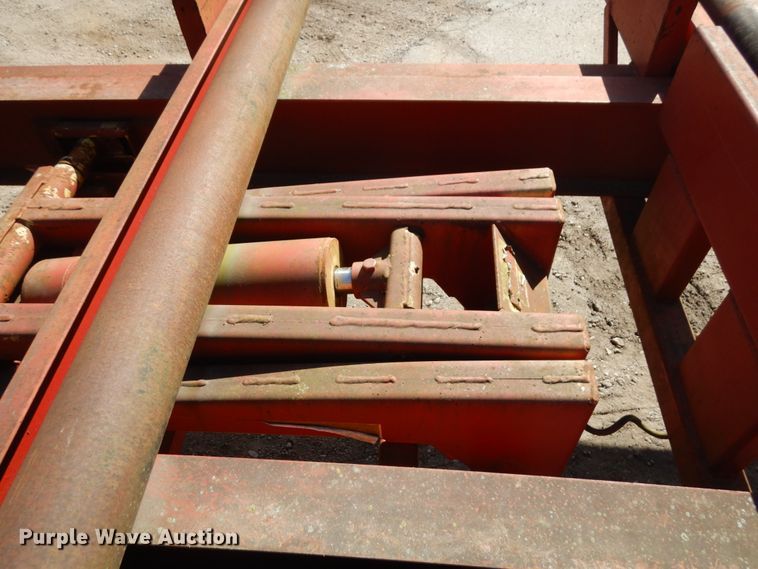 image for item HD9097 2006 Trussmaster roll off tilt deck trailer