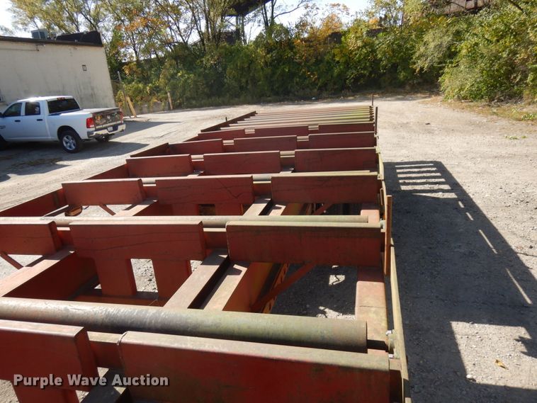 image for item HD9097 2006 Trussmaster roll off tilt deck trailer