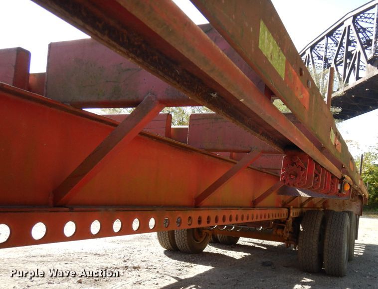 image for item HD9097 2006 Trussmaster roll off tilt deck trailer