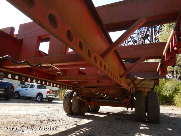 image for item HD9097 2006 Trussmaster roll off tilt deck trailer