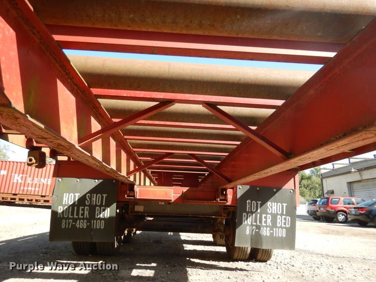 image for item HD9097 2006 Trussmaster roll off tilt deck trailer