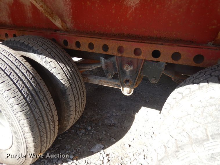 image for item HD9097 2006 Trussmaster roll off tilt deck trailer