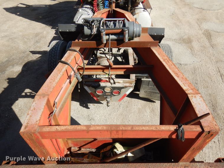 image for item HD9097 2006 Trussmaster roll off tilt deck trailer