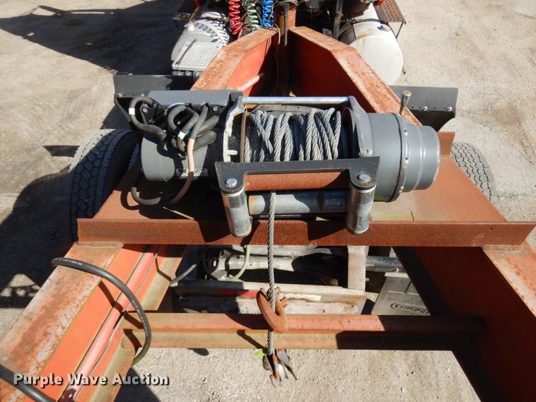 image for item HD9097 2006 Trussmaster roll off tilt deck trailer