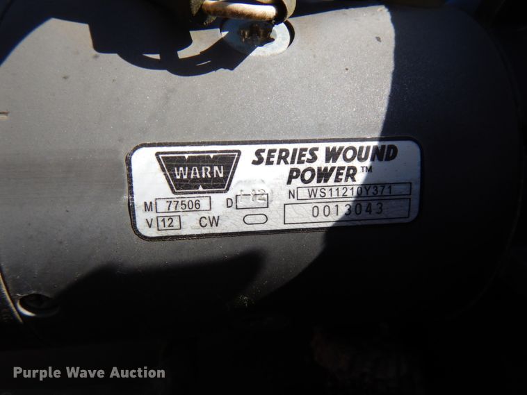 image for item HD9097 2006 Trussmaster roll off tilt deck trailer