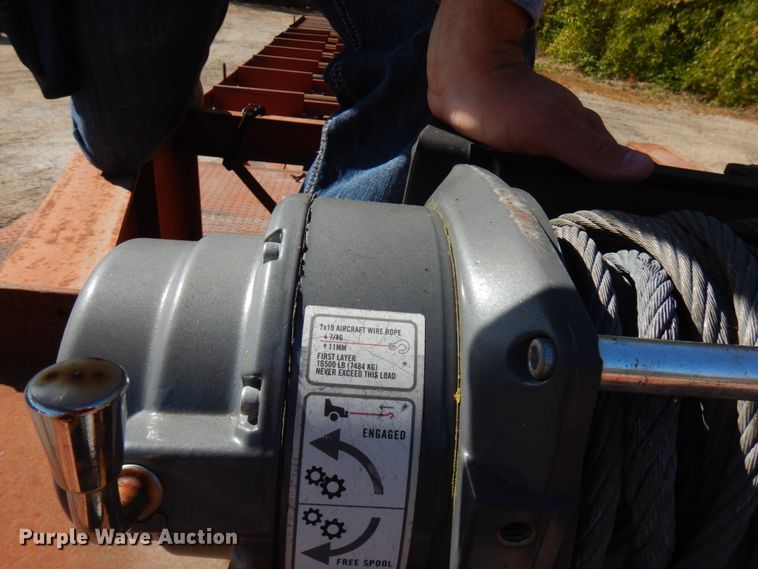 image for item HD9097 2006 Trussmaster roll off tilt deck trailer