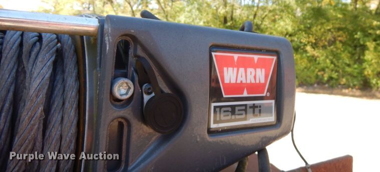 image for item HD9097 2006 Trussmaster roll off tilt deck trailer